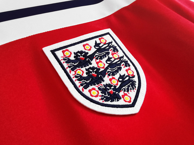 a_03_69f030fd-b1c7-4740-b27d-9fd05804bb2c.jpg ENGLAND 1982 RED AWAY RETRO FOOTBALL SHIRT