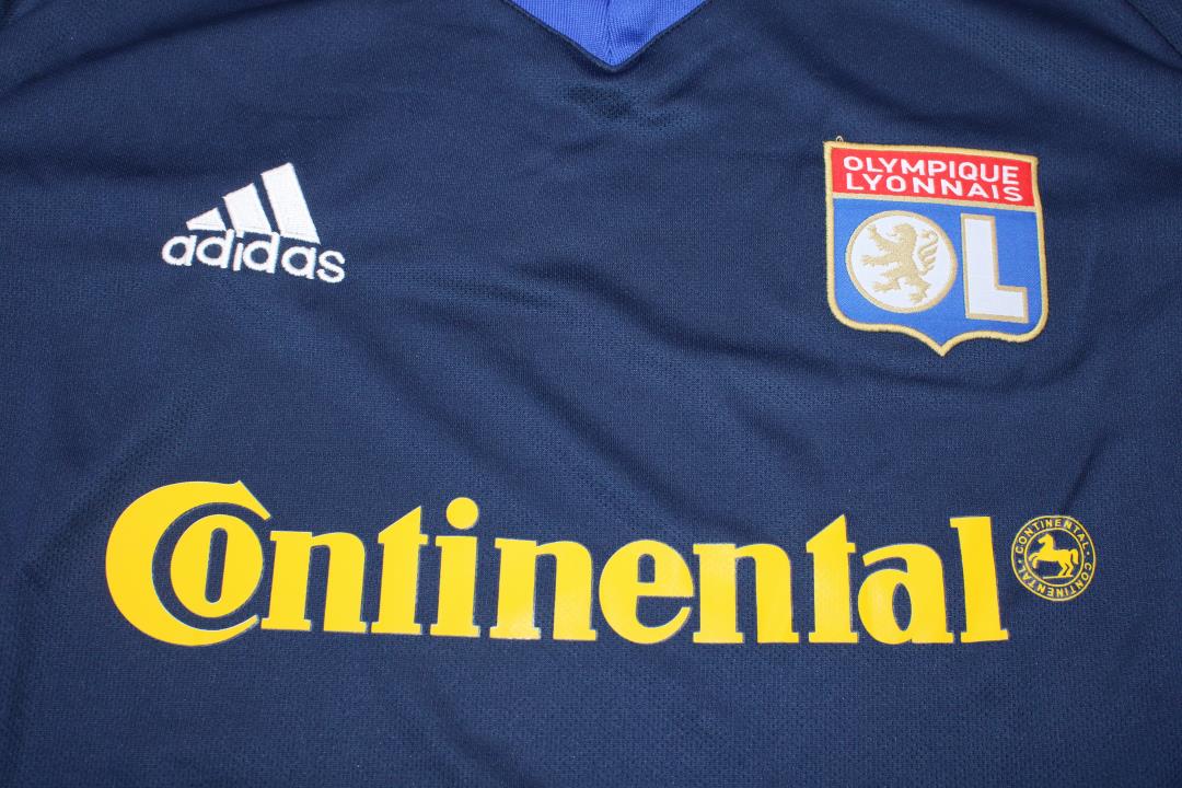 a_04_17_55abe2ef-8f66-46a4-8b42-2018d1c2aff2.jpg LYON 2001-2002 AWAY DARK BLUE RETRO FOOTBALL SHIRT