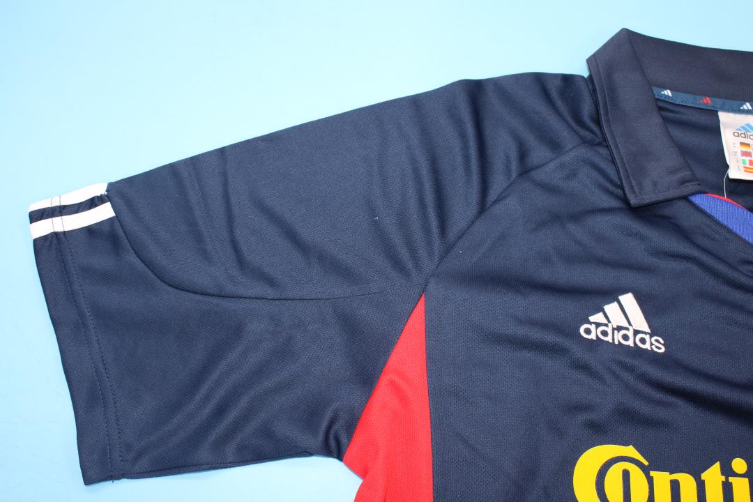 a_05_25_38607a6e-c0c2-4d6a-9d9b-8d3c20c642a2.jpg LYON 2001-2002 AWAY DARK BLUE RETRO FOOTBALL SHIRT