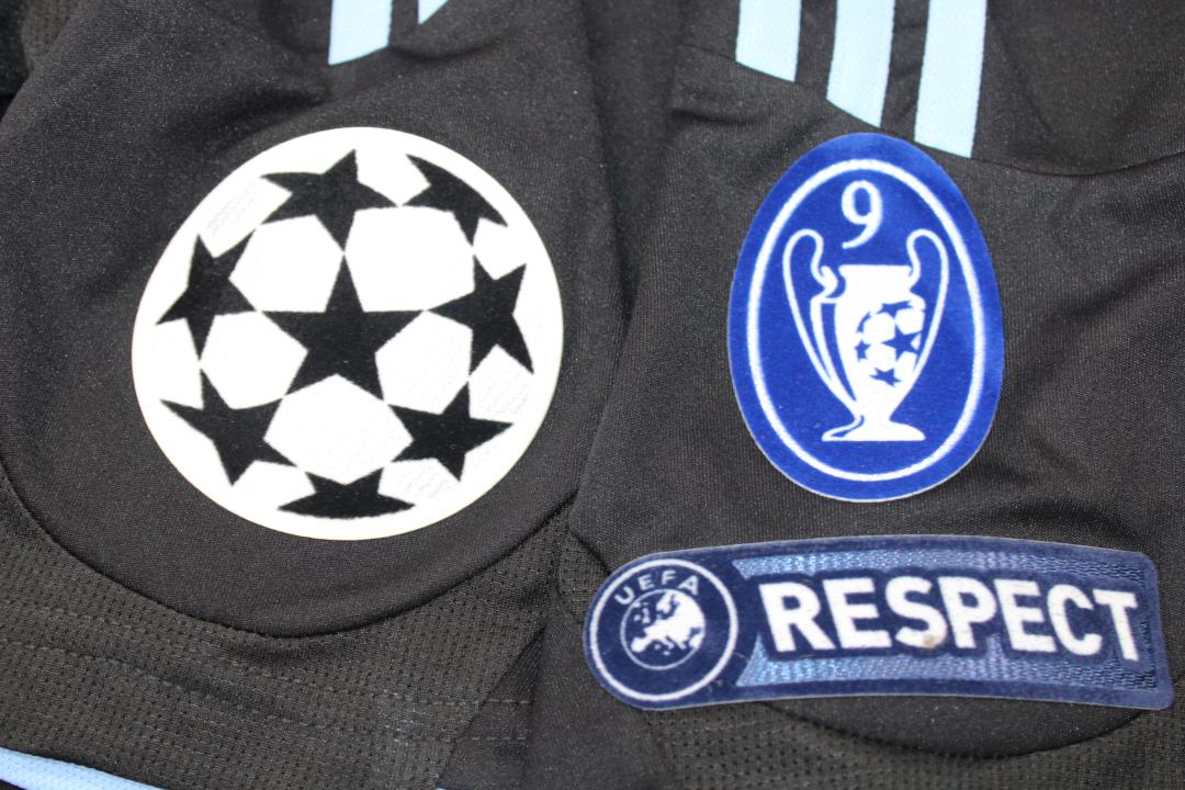 a_09_1_e0d6ef5f-e9d2-49fb-b19d-756c2e71680e.jpg REAL MADRID 09/10 BLACK AWAY RETRO FOOTBALL SHIRT