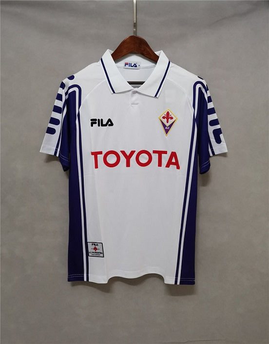 a_5050b900-124e-4c1f-ae1e-bab30eaef550.jpg FIORENTINA 1999-2000 AWAY RETRO FOOTBALL SHIRT